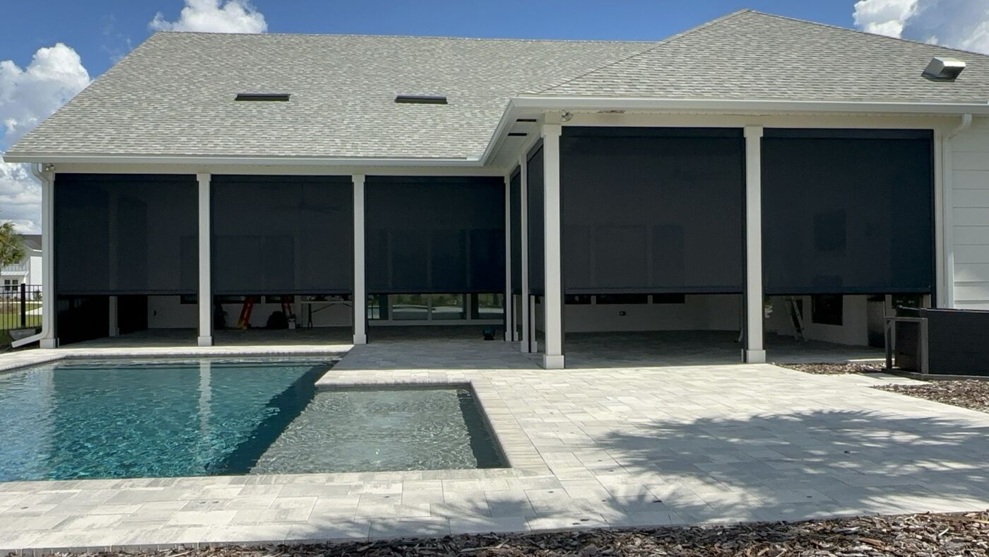 Poolside lanai with motorized screens
