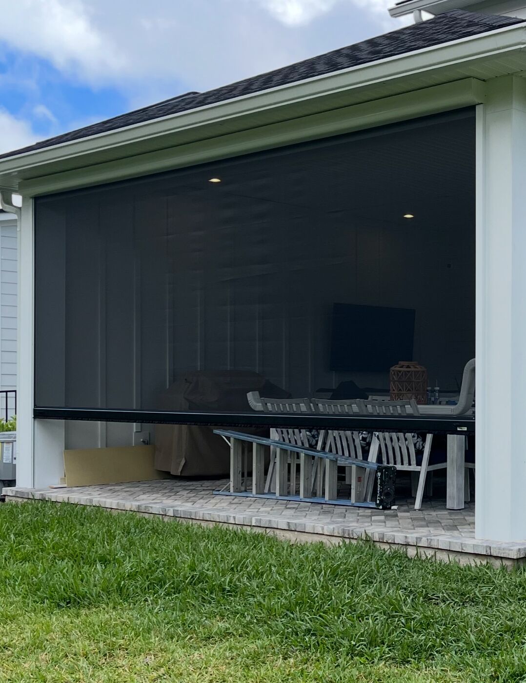 Covered patio screen enclosure